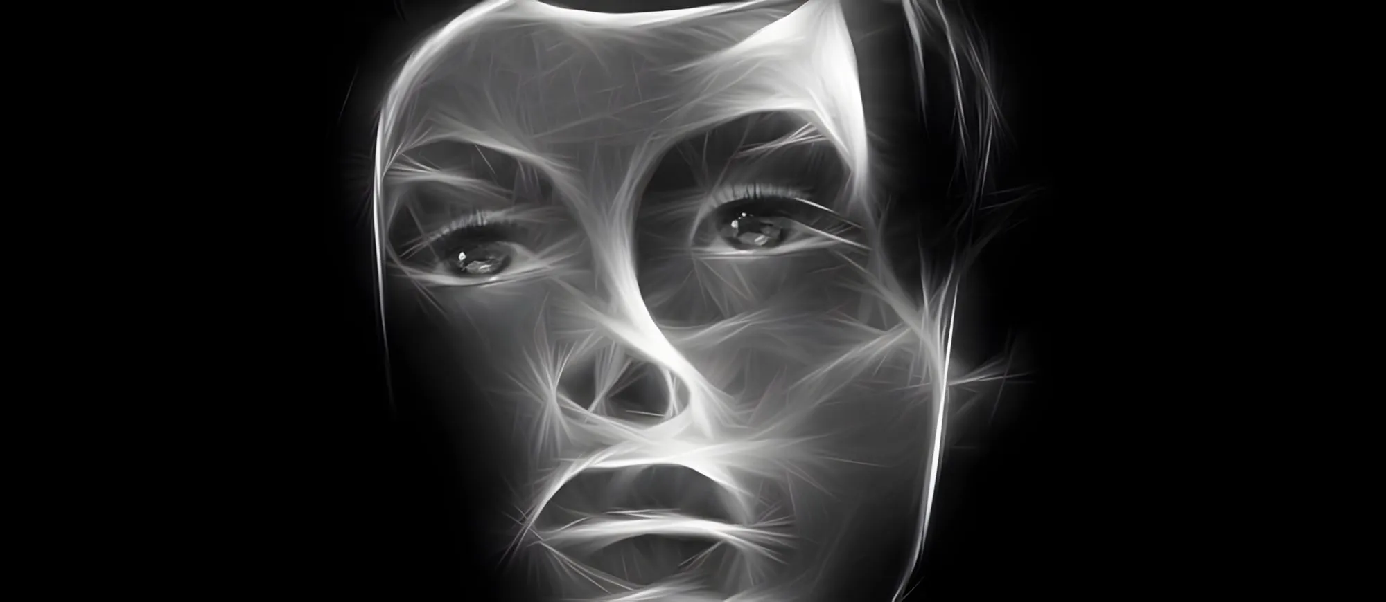 Volto in bianco e nero reso con linee luminose, con uno sguardo triste e occhi lucidi