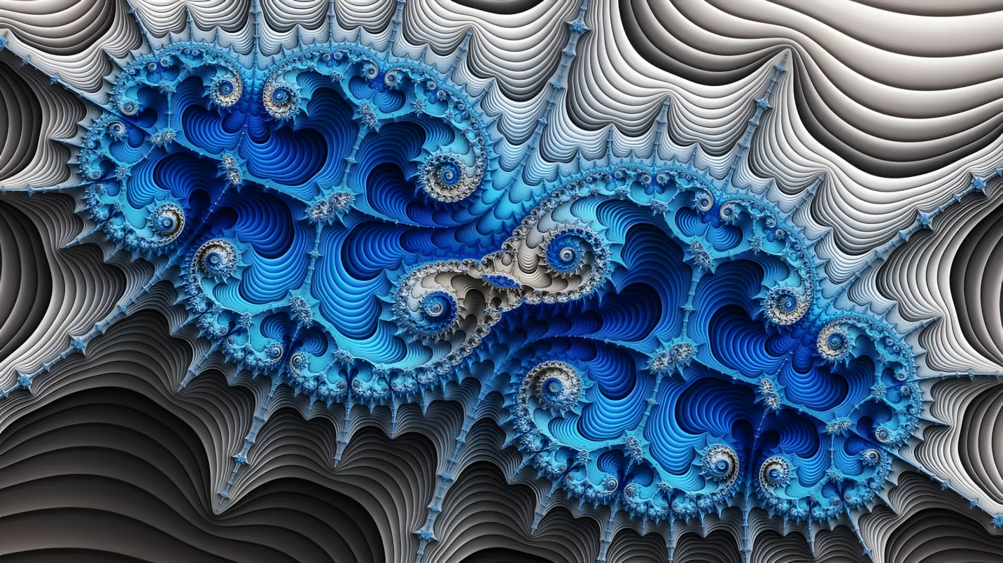 Frattale con spirali blu e grigie dai dettagli finissimi, che ricordano onde e conchiglie