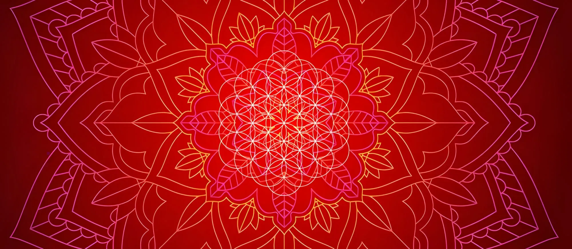 Mandala rossa e arancione con al centro il fiore della vita, fatto di cerchi intrecciati