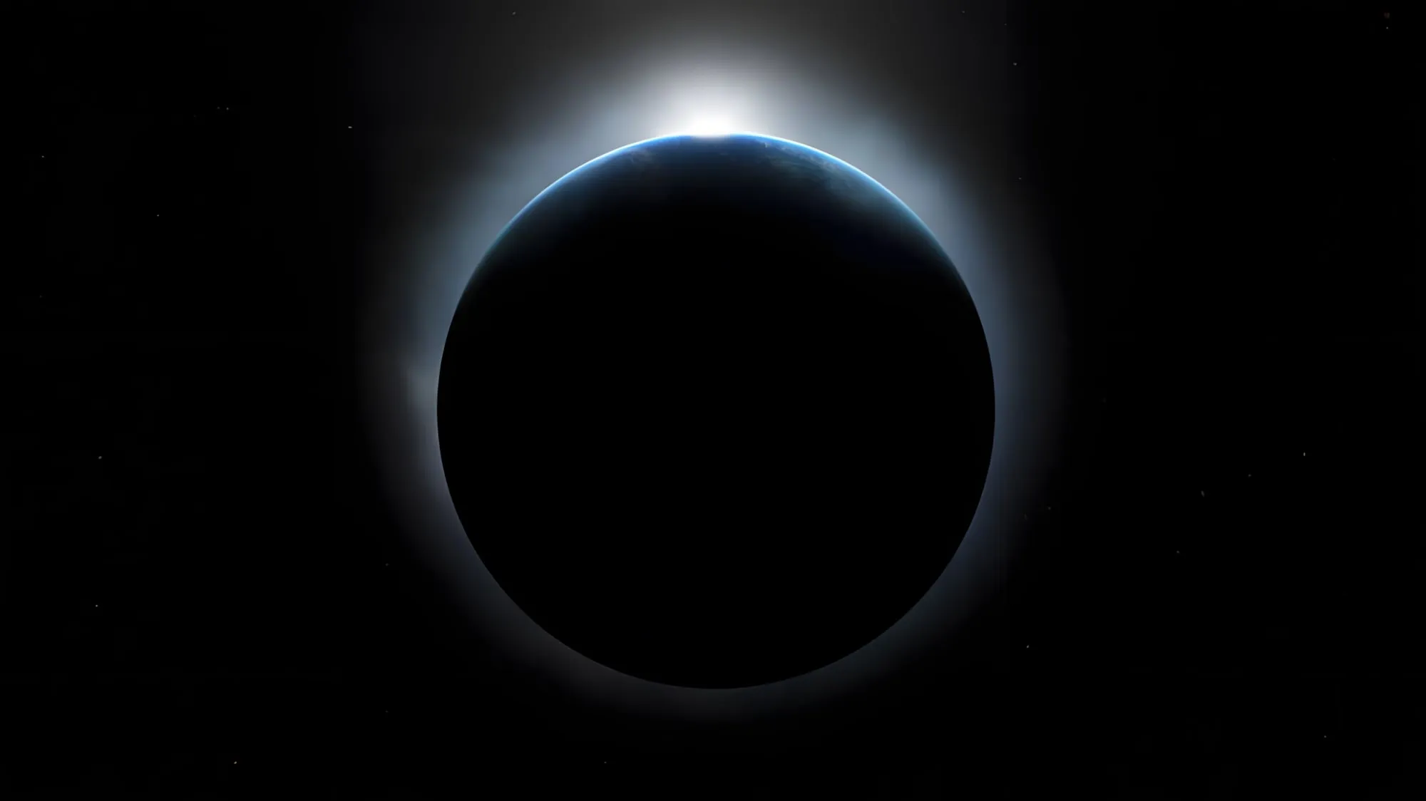 Pianeta nero in controluce nello spazio, con un bagliore al margine, come in un'eclisse