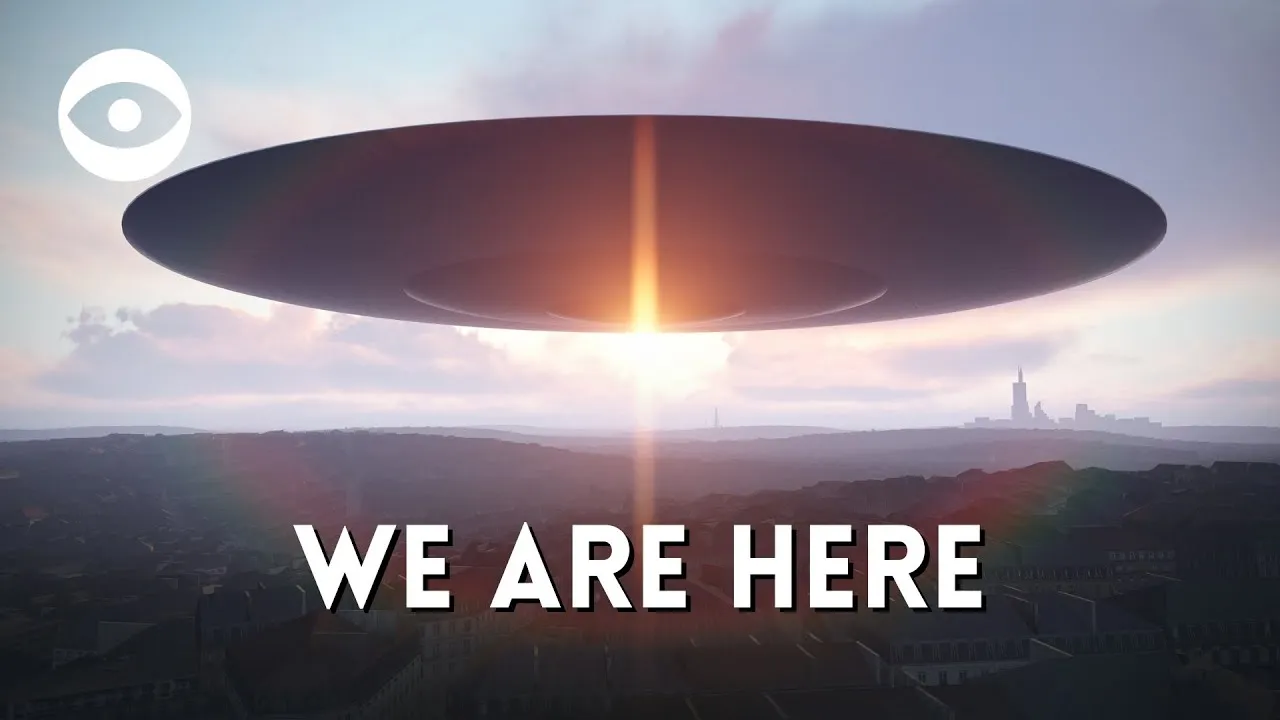 Miniatura del video: enorme disco volante sopra una città, con la scritta We are here