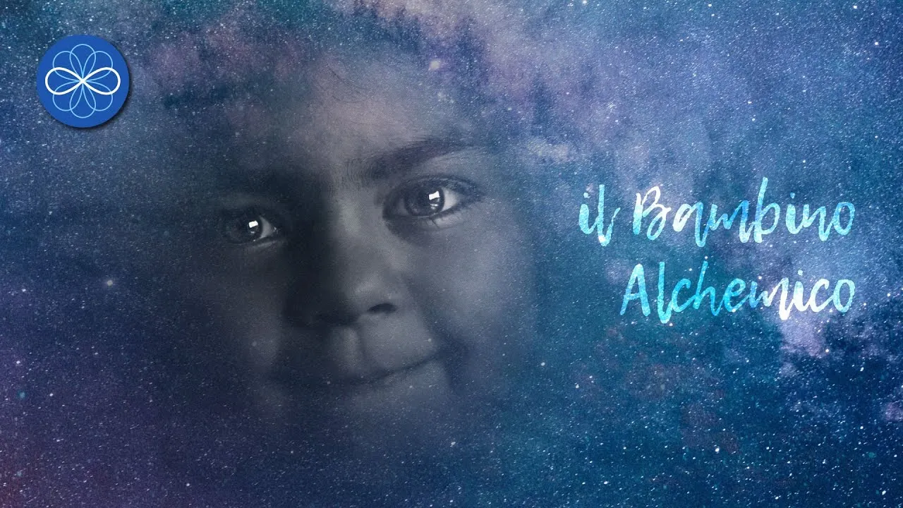 Anteprima del video: il volto di un bambino tra le stelle, con il titolo Il Bambino Alchemico