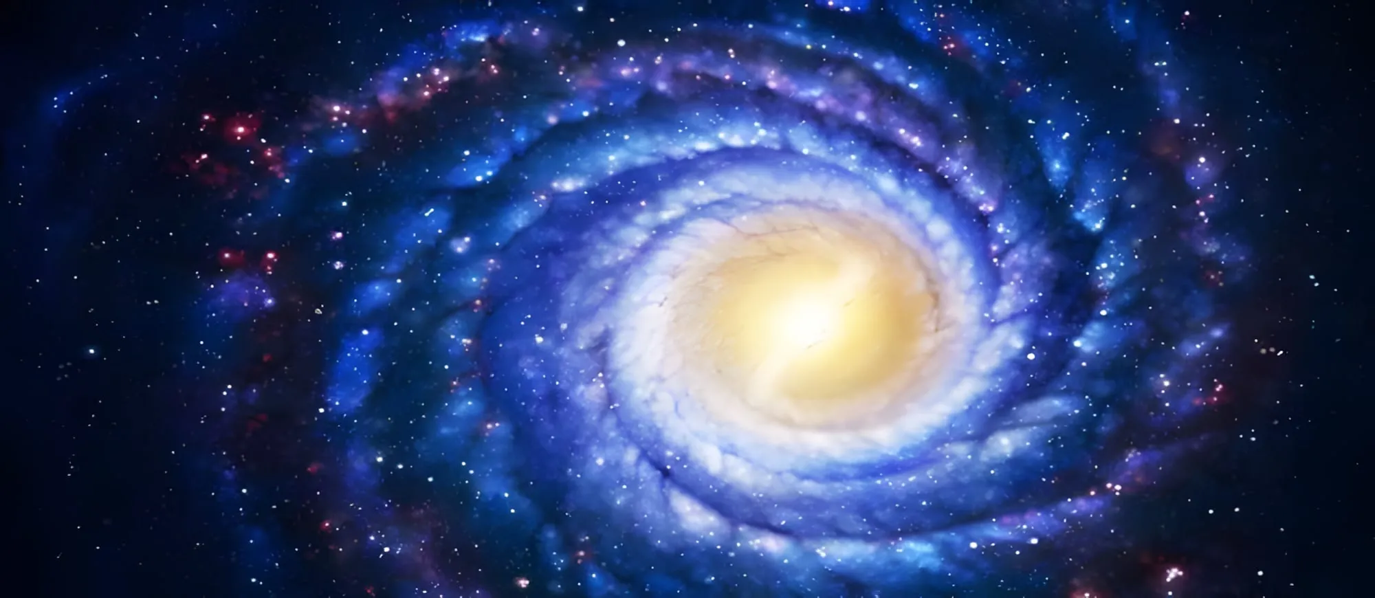 Galassia a spirale blu con un nucleo luminoso giallo al centro, circondata da stelle